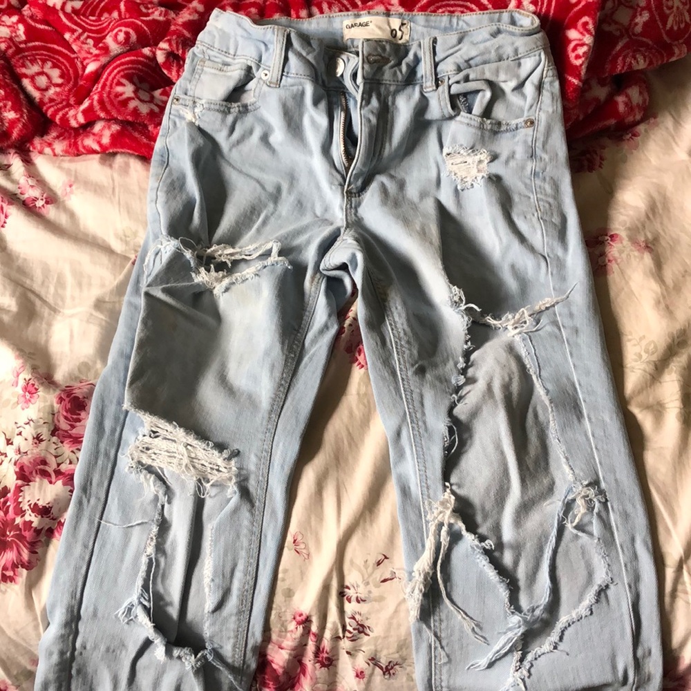 Distressed light wash jeans